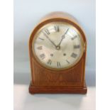 Oak cased dome top two train mantel clock, silvered dial engraved with Roman numerals, striking on a