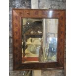 A good quality William and Mary style wall mirror of rectangular form with bevelled edge plate