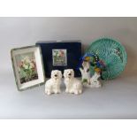 A pair of Royal Doulton spaniels in the Staffordshire manner, a Capodimonte model of a pair of