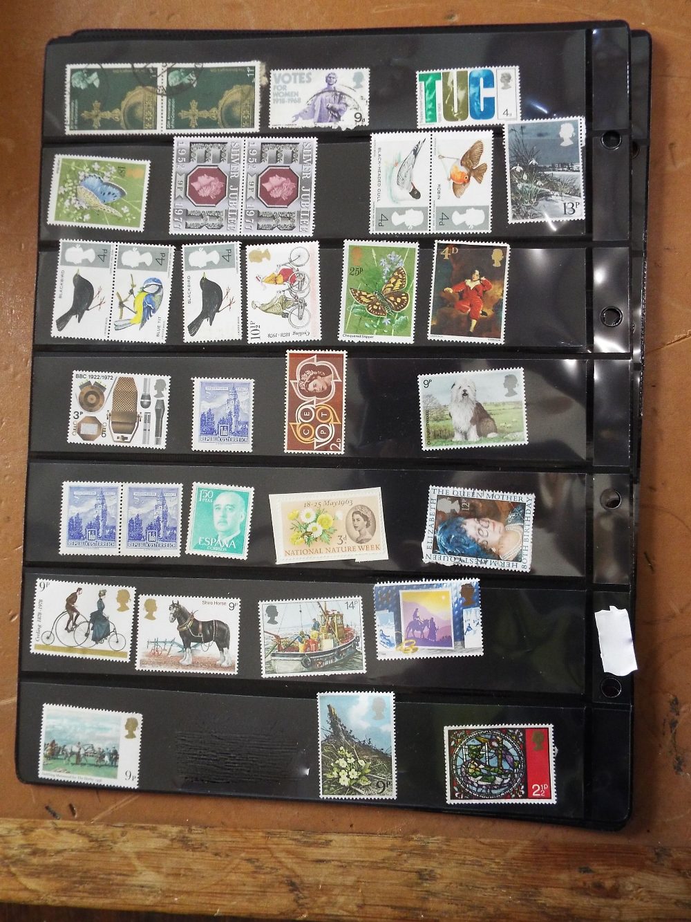 Three sheets of mostly British stamps, some mint together with a pocket watch and winder (4) ( - Image 3 of 4