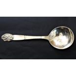 Carl Poul Petersen - Danish silver planished ladle type serving spoon, with embossed floral knop,