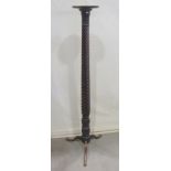 A mahogany torchere with rope twist column and shaped tripod supports (fashioned from a 19th century