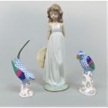 A boxed Lladro Daisa figure from the 2005 Events Creation series of a young girl holding a hat (