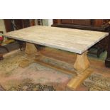 A Nordic style refectory table, the oak top with scrubbed and fumed finish, raised on a pair of