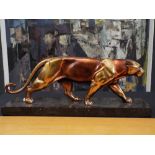 Art Deco gilt spelter figure of a panther upon a marble base, 45cm long
