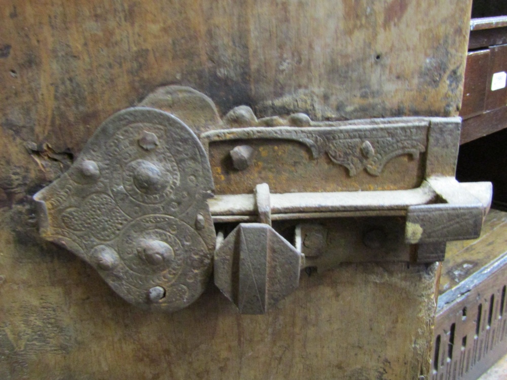 A 17th century pine side cupboard of continental origin, the central door with ironwork fittings, - Image 7 of 7