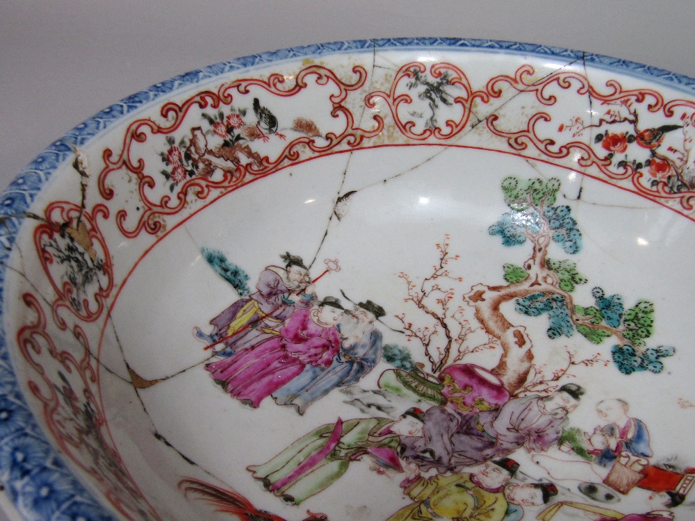 A 19th century oriental bowl with famille rose painted decoration of male characters in a - Image 3 of 4