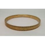 9ct bangle with Greek key decoration, with pouch, 13.8g