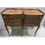 A pair of side tables with floral marquetry decoration, the three quarter gallery tops over three