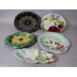 A 19th century majolica type serving plate of oval form, modelled as sweet corn, together with a