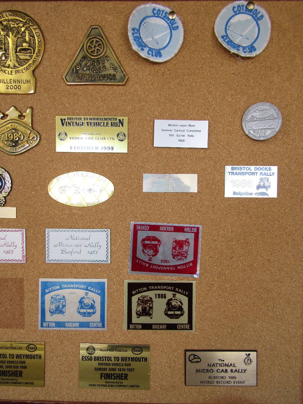 A cork board displaying a number of vintage transport rally plaques, circa 1980/2000 - Image 3 of 3