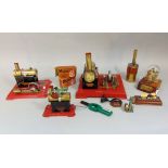 Collection of small Mamod model steam engines, together with a model Edison stock ticker with