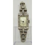 Ladies Art Deco 9ct diamond cocktail watch with 15 jewel movement, the square dial with Arabic