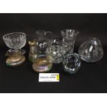 A collection of glassware including a garniture of three early 20th century art glass vases with