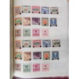 A neatly arranged GB Commonwealth and world stamps collection in four albums including mint blocs