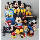 Mickey Mouse collection including a talking alarm clock, deco Mickey clock, money box, phone,