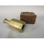 A 19th century brass surveyors cross of octagonal form, with detachable handle and hardwood box