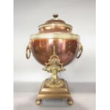 A good Regency copper and brass banded samovar of usual form raised on a waisted foot and square cut