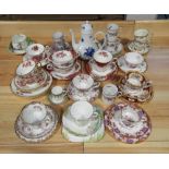 A collection of decorative cups and saucers and trios including Royal Albert Dimity Rose,