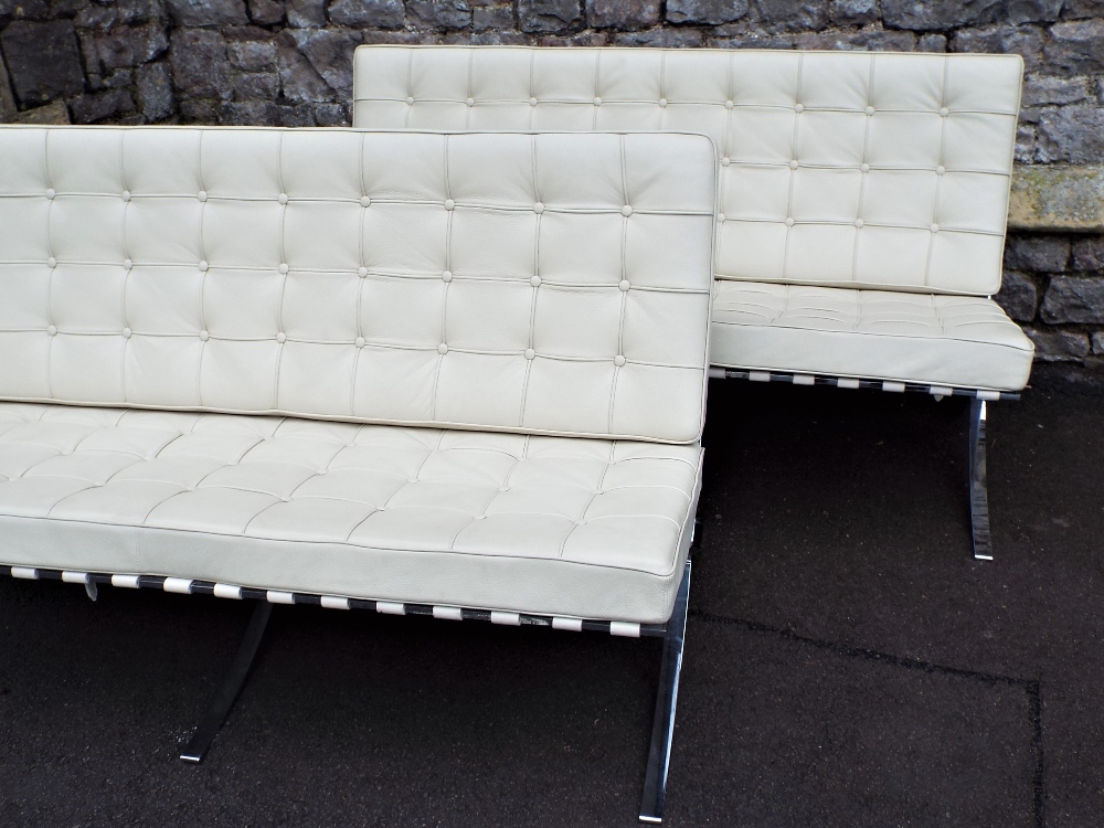 After Mies Van Der Rohe (1886-1969) - 'Barcelona' pair of sofas, in cream leather on chrome frames