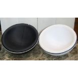 A pair of unusual retro style, low moulded, plastic dish shaped chairs, with stitched leather
