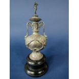 Walker & Hall silver bottle neck lidded golfing trophy with twin handles, mounted by a golfer with