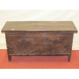 A small six plank coffer in both oak and elm, the front elevation with repeating geometric detail,