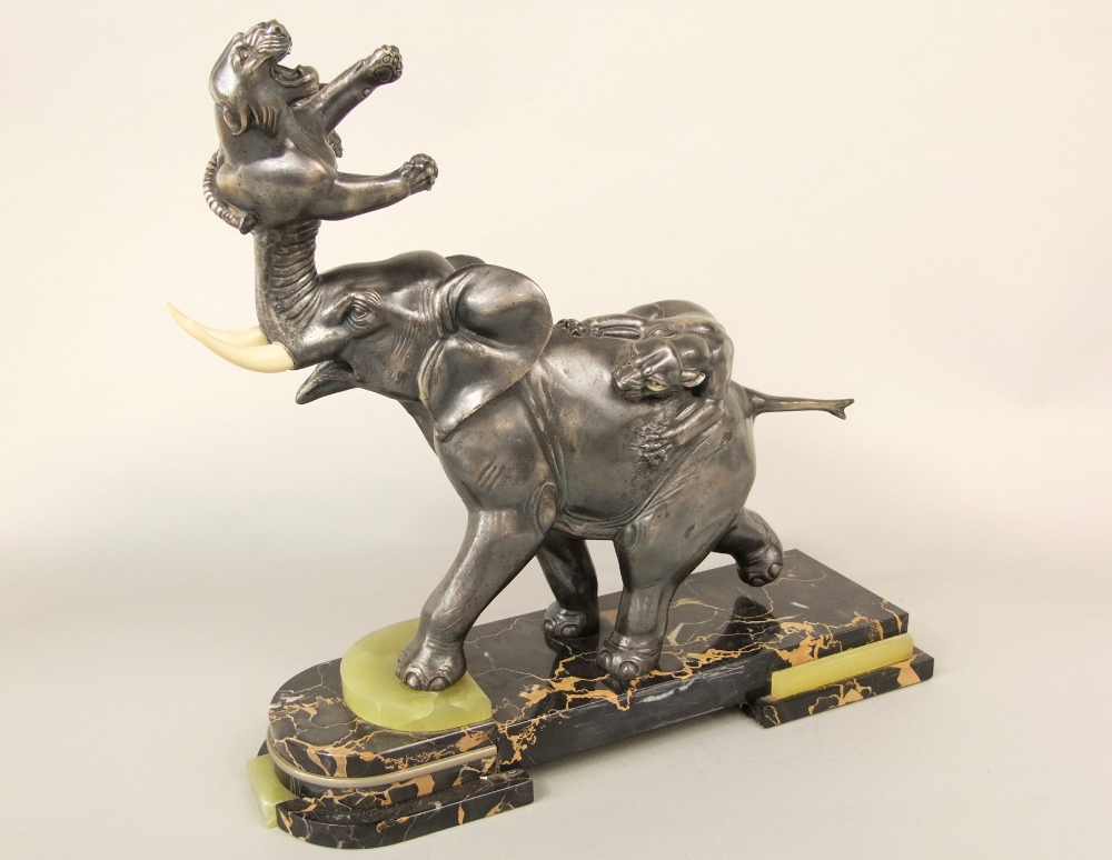 Irenee Rochard (1906-1984, French) - Good cast spelter figural character group of an elephant