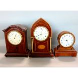 Three small Edwardian timepieces to include a drumhead mantel clock, a lancet clock with brass