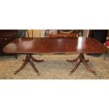 A good quality reproduction regency style D end twin pillar dining table with reeded outline and