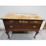 A late 19th century mahogany chest of one long and three short drawers raised on four shaped