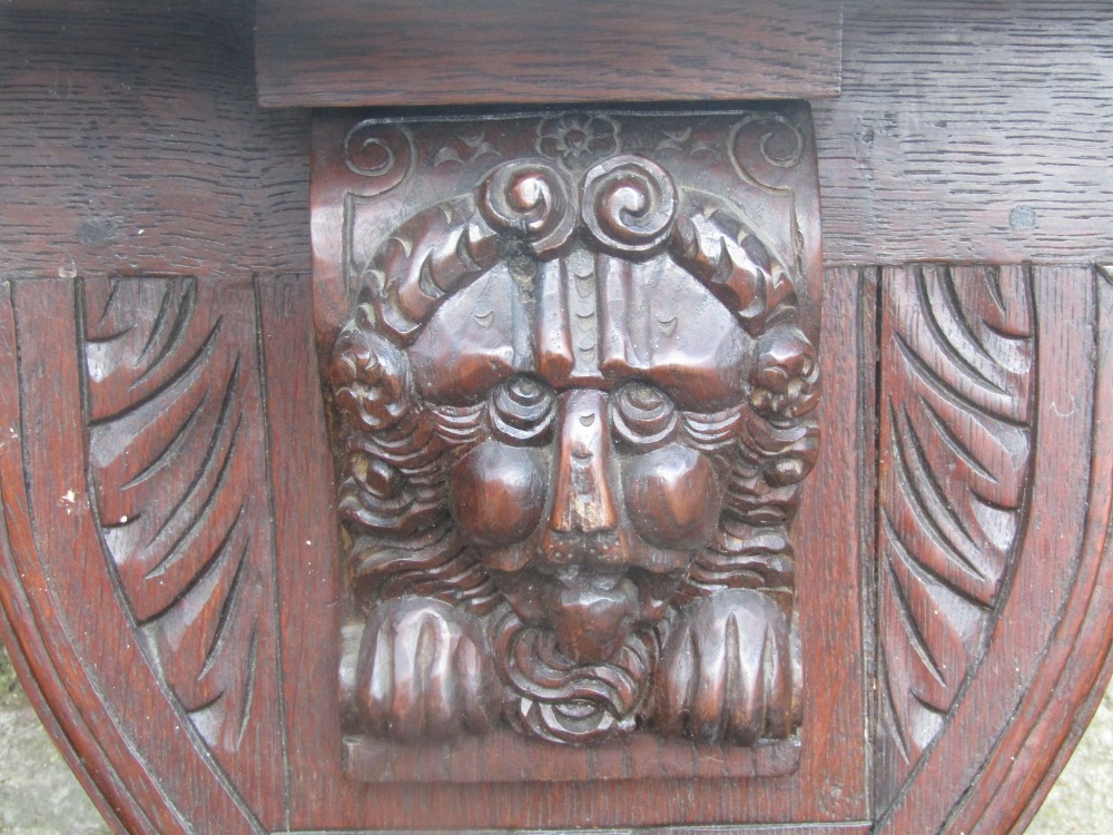 A pair of 19th century overmantels, the profusely carved oak frames with lions mask bosses, part - Image 2 of 3