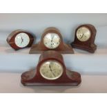 Four mantel clocks to include a three train Napoleon hat example