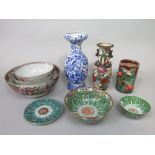 A collection of 19th century and other oriental ceramics including a vase with blue and white
