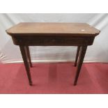 A good quality Edwardian mahogany foldover top card table enclosing a single frieze drawer, raised