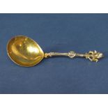 Good quality Victorian silver gilt spoon, the handle cast in the Adam style with masks and round