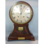 Early 20th century two train mahogany balloon head mantel clock, the silver dial with engraved Roman