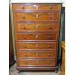 A good quality 19th century tower of seven graduated drawers, with canted corners, set beneath a
