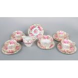 A collection of Grosvenor China teawares with pink painted and gilded rose comprising milk jug,