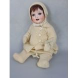 Vintage German bisque headed doll marked '300' with closing eyes, jointed limbs, open mouth and