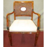 A good quality Adams style open armchair, the cane panelled back incorporating a central timber