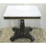 A 19th century mahogany centre table with rectangular marble top, raised on a central turned pillar,