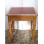 A light oak library or office table of rectangular form, with inset faux leather writing surface
