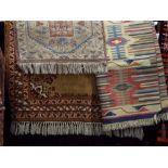 Full pile Eastern rug with central medallion upon a fawn ground, 200 x 130 cm; together with a