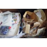 Four boxes of GB & world postage stamps in bags, stockbooks etc