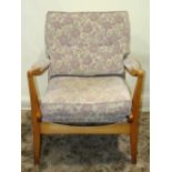A pair of vintage Cintique open armchairs, with loose upholstered cushions and shaped beechwood