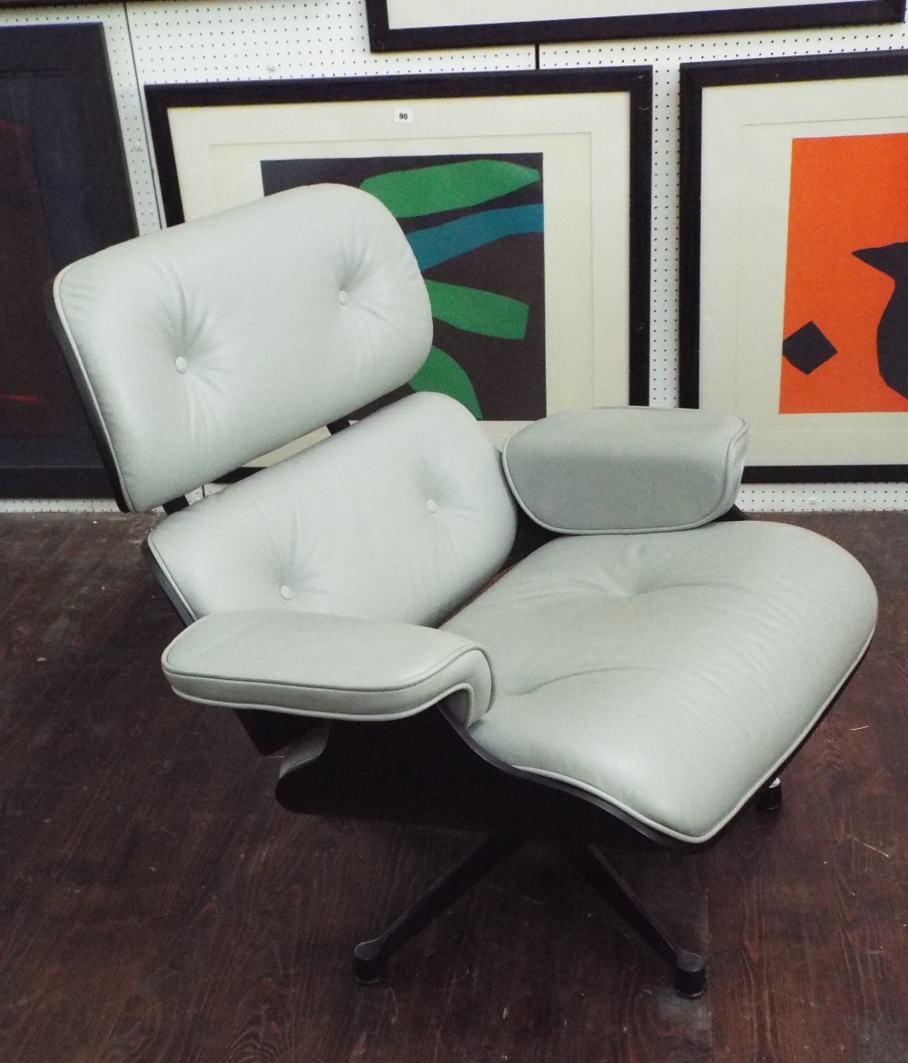 After Charles and Ray Eames - bespoke lounge chair and footstool, with grey leather upholstery upon - Image 2 of 3