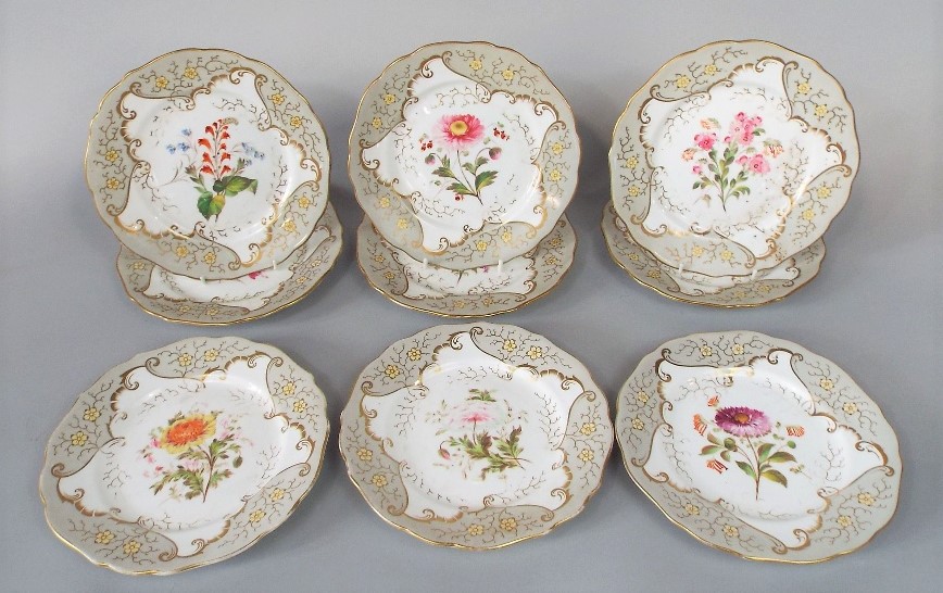 A collection of 19th century dessert wares with painted botanical sprays within a pale grey and gilt - Image 2 of 2