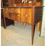 A good quality Georgian style mahogany sideboard with serpentine front and inlaid detail,