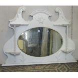 Three Edwardian overmantel mirrors of varying size and design, with moulded and carved detail, one